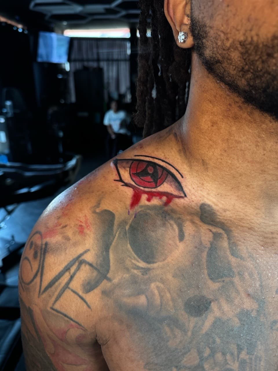 Anime + Pop Culture eye tattoo on Shoulder by 1UP_Uncle_Frecks on TattMe