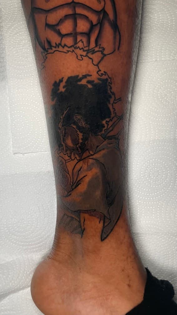 Black & Grey + Illustrative afro tattoo on Calf by 1UP_Uncle_Frecks on TattMe