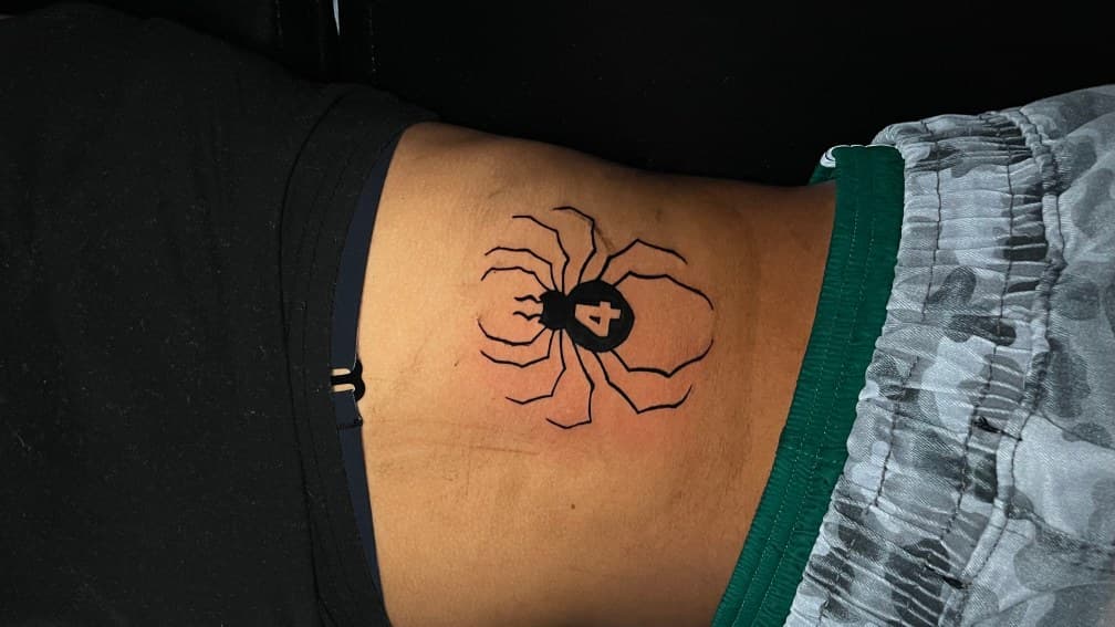 Black-work + Illustrative spider tattoo on Lower Back by 1UP_Uncle_Frecks on TattMe