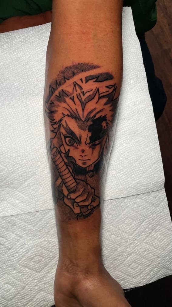 Anime + Black & Grey rengoku tattoo on Forearm by 1UP_Uncle_Frecks on TattMe