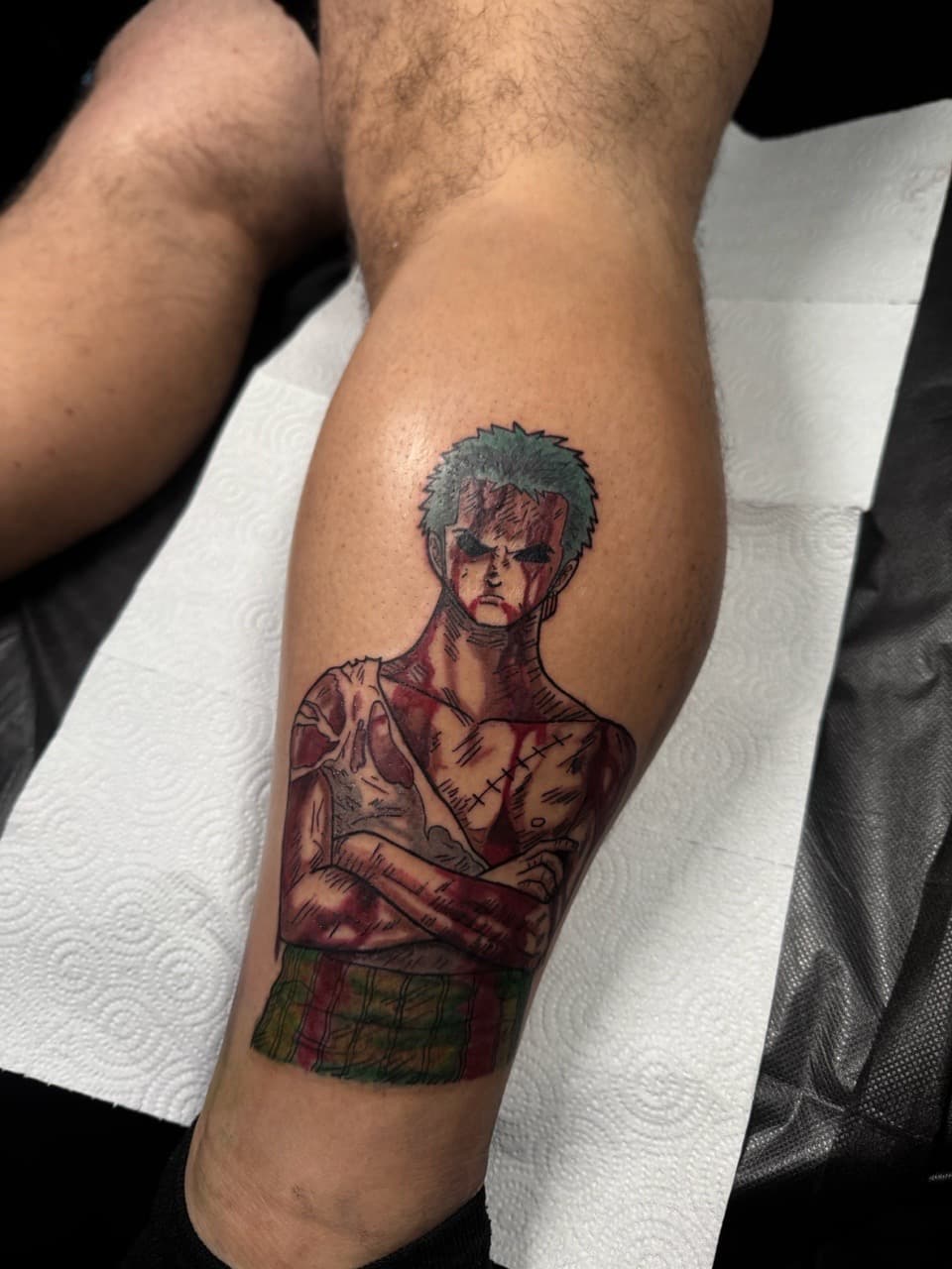 Anime + Color zoro tattoo on Calf by 1UP_Uncle_Frecks on TattMe
