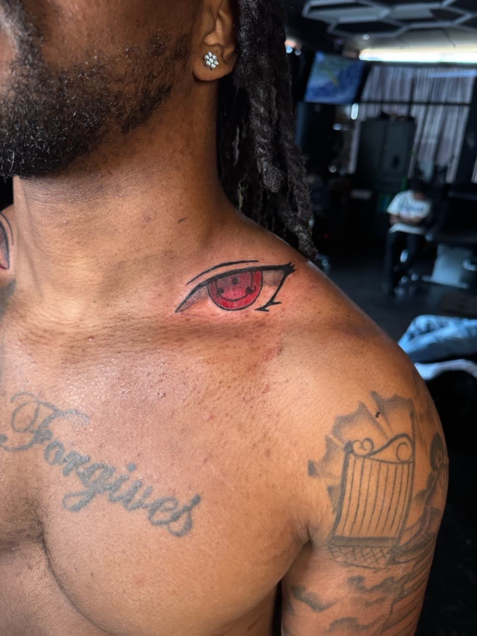 Anime + Pop Culture eye tattoo on Chest by 1UP_Uncle_Frecks on TattMe