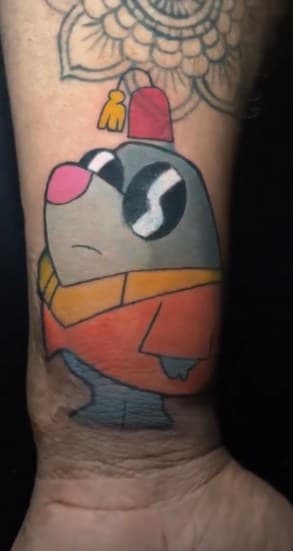 Cartoon + Color hat tattoo on Wrist by 1UP_Uncle_Frecks on TattMe