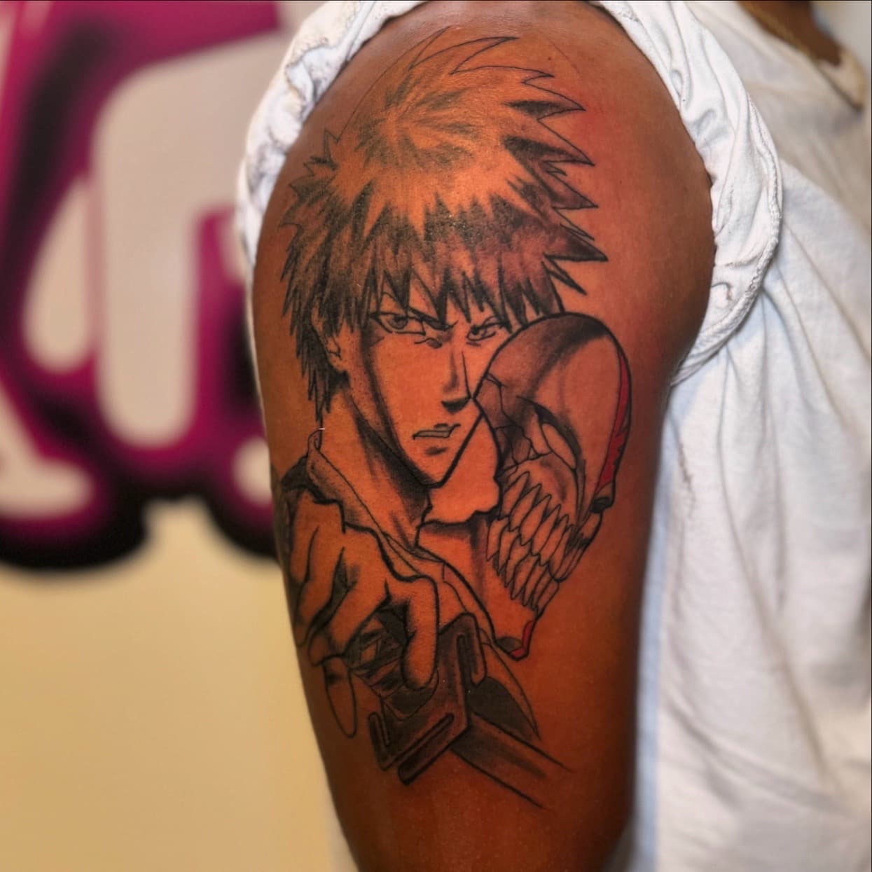 Anime + Black & Grey mask tattoo on Upper Arm by 1_Mo_Tatt on TattMe