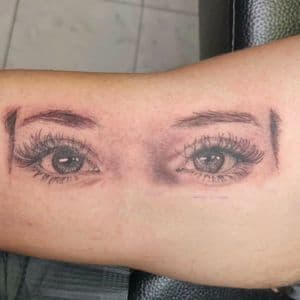 Realism + Black & Grey eyebrows tattoo on Upper Arm by The_Alley_Tattoo_Studio on TattMe