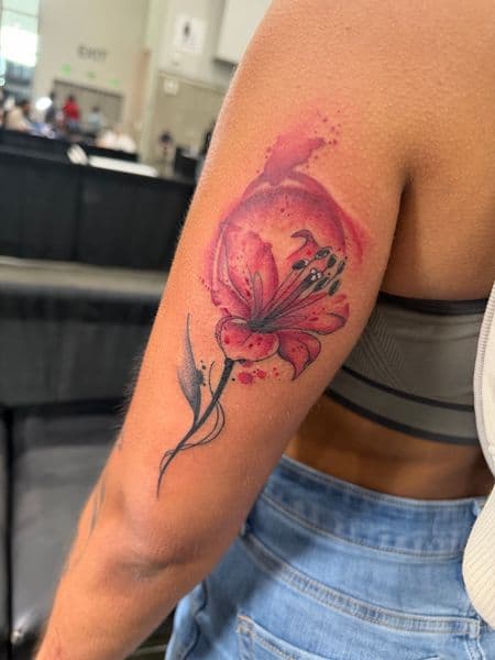 Watercolor + Floral flower tattoo on Upper Arm by Inkflowjo on TattMe