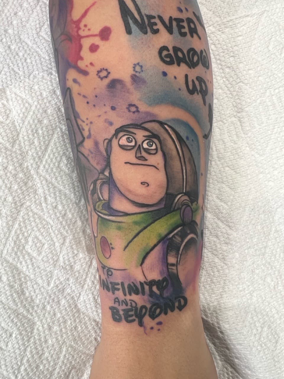 Pop Culture + Cartoon buzz lightyear tattoo on Forearm by Inkflowjo on TattMe