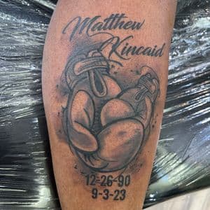 Black & Grey + Lettering boxing gloves tattoo on Calf by Inkflowjo on TattMe