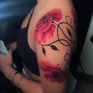 Watercolor + Floral flowers tattoo on Upper Arm by Inkflowjo on TattMe