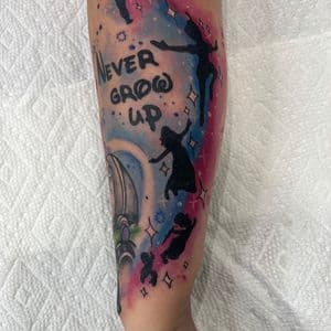 Watercolor + Pop Culture peter pan tattoo on Forearm by Inkflowjo on TattMe