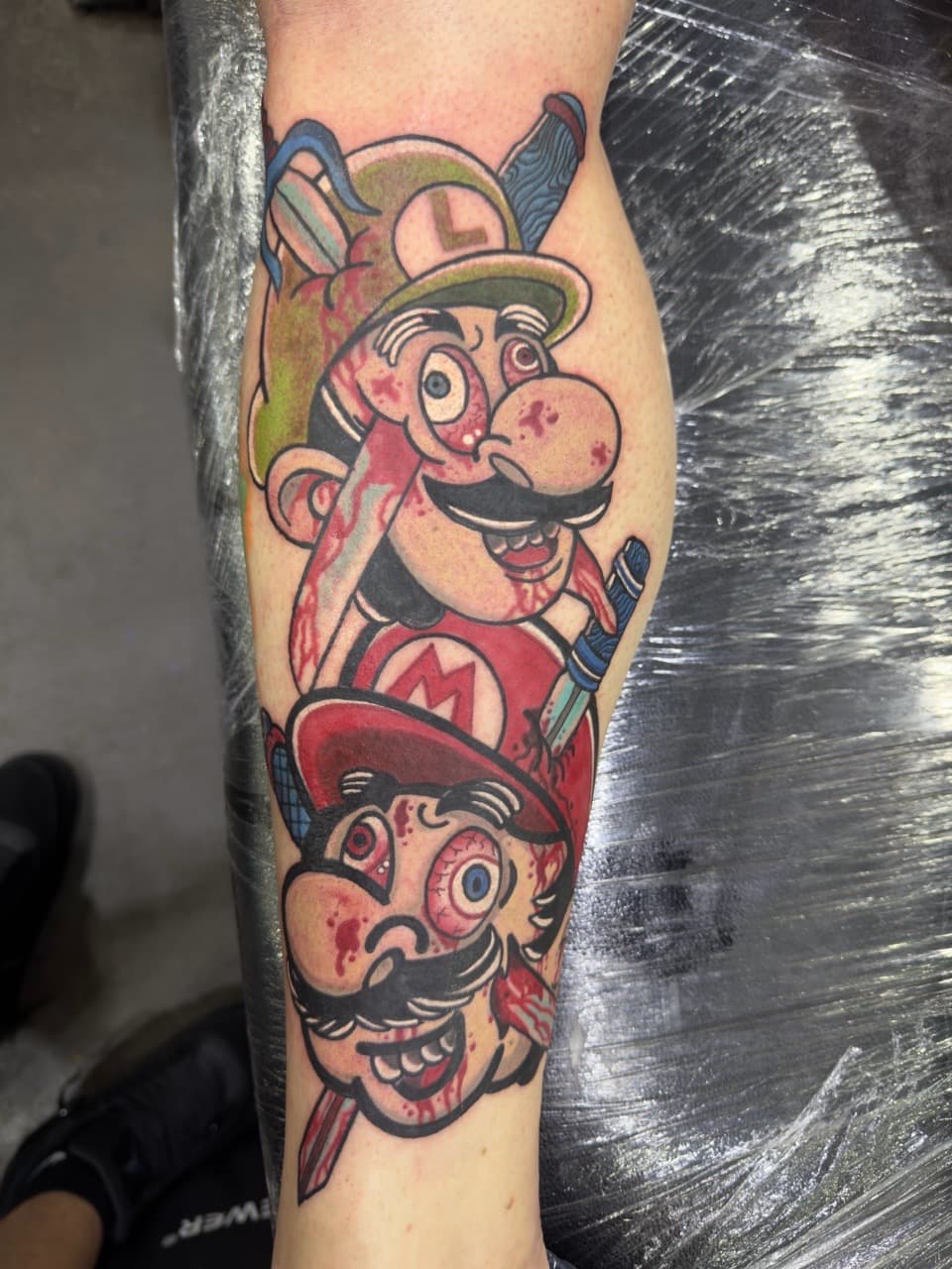 New School + Cartoon mario tattoo on Calf by Inkflowjo on TattMe