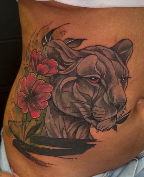 Illustrative + Color puma tattoo on Ribs by Inkflowjo on TattMe
