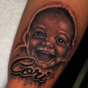 Realism + Portrait baby tattoo on Upper Arm by Inkflowjo on TattMe