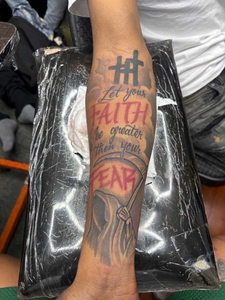 Black & Grey + Lettering crosses tattoo on Forearm by tattoo_panda on TattMe