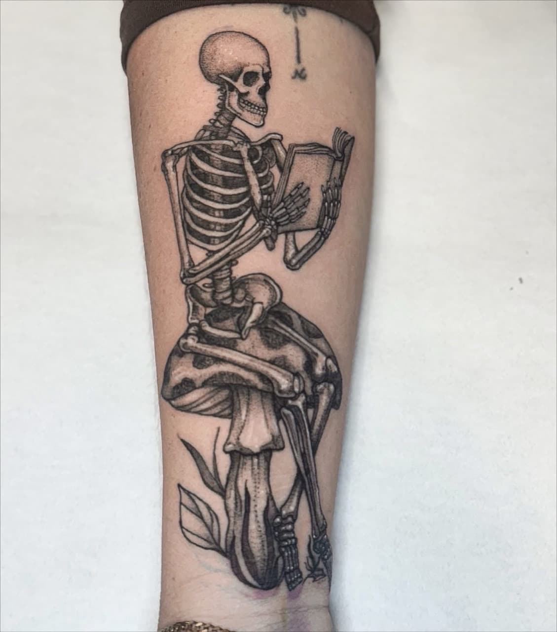 Black & Grey + Illustrative skeleton tattoo on Forearm by Ashley_Jolly_Tattoo on TattMe