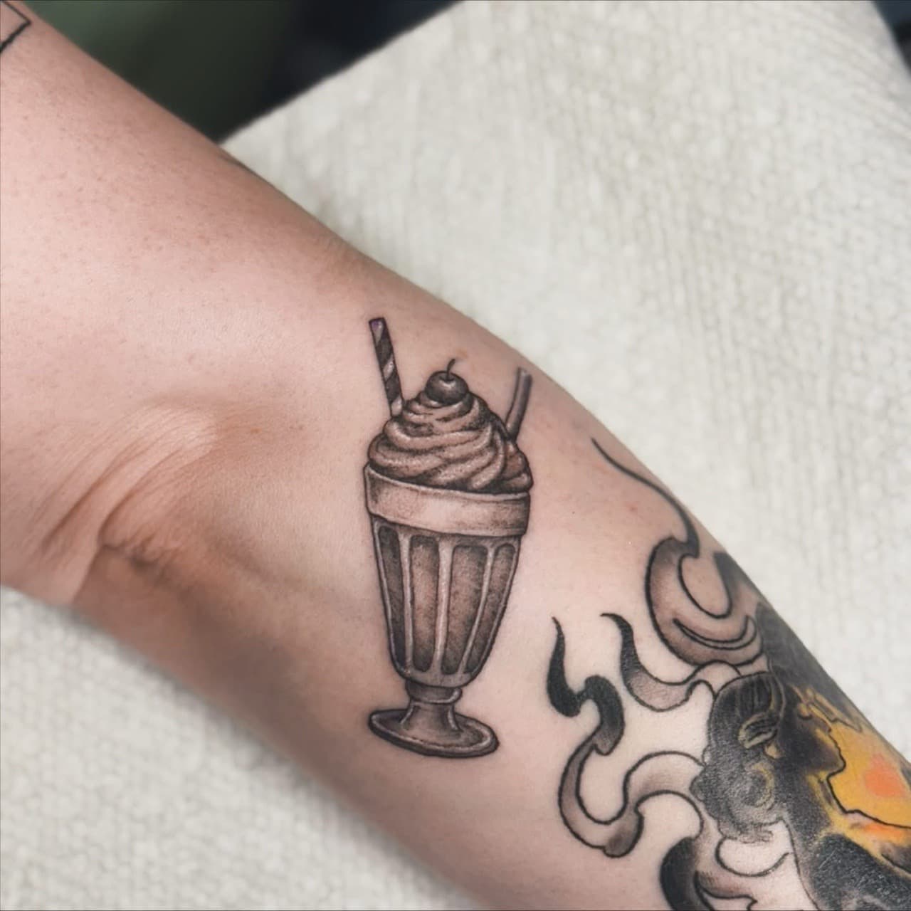 Black & Grey + Illustrative milkshake tattoo on Forearm by Ashley_Jolly_Tattoo on TattMe