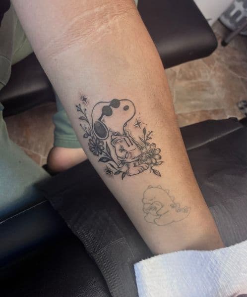 Black & Grey + Illustrative snoopy tattoo on Forearm by The_Key_Inks on TattMe