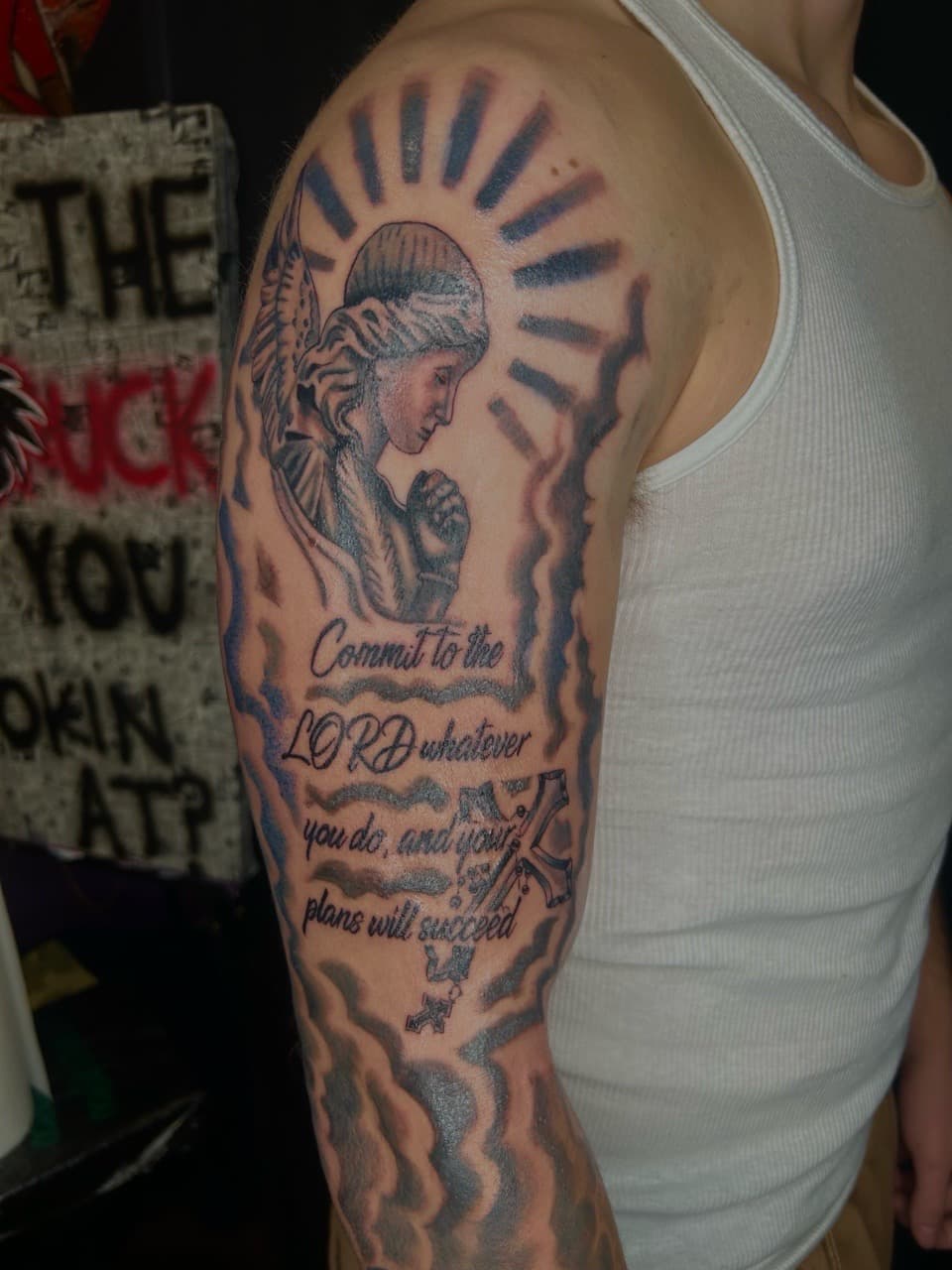 Black & Grey + Lettering angel tattoo on Upper Arm by KC on TattMe