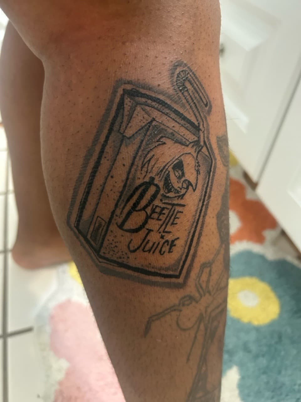 Black & Grey + Illustrative beetlejuice tattoo on Upper Arm by KC on TattMe