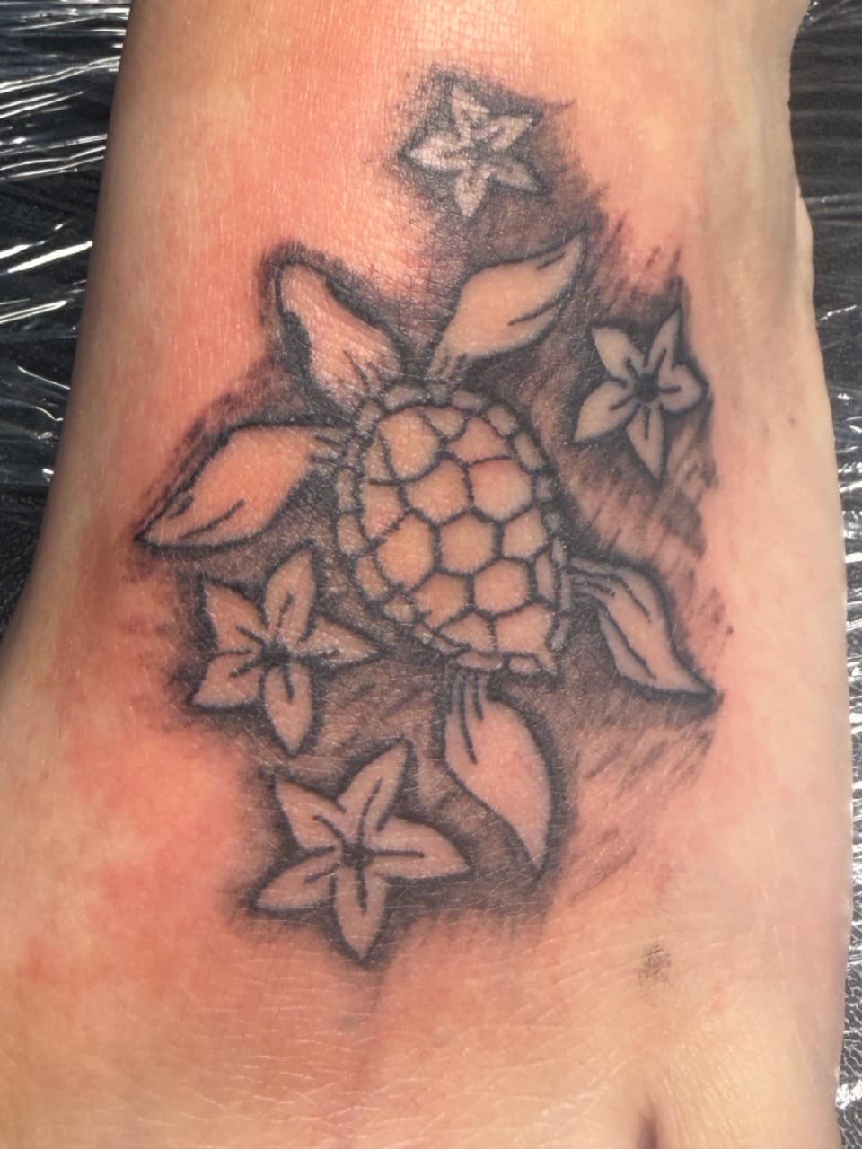 Black & Grey + Illustrative turtle tattoo on Foot by Apex_Effort_Studio on TattMe
