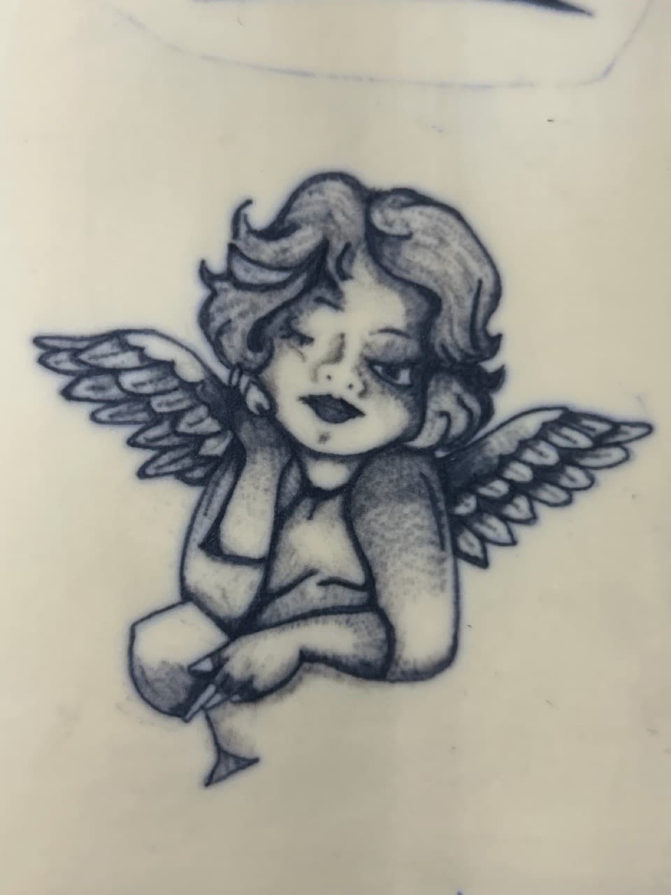 Black & Grey + Illustrative cherub tattoo by Apex_Effort_Studio on TattMe