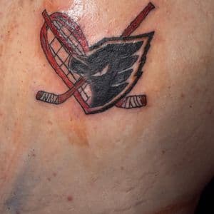 Color + Illustrative hockey sticks tattoo on Shoulder Blade by Apex_Effort_Studio on TattMe