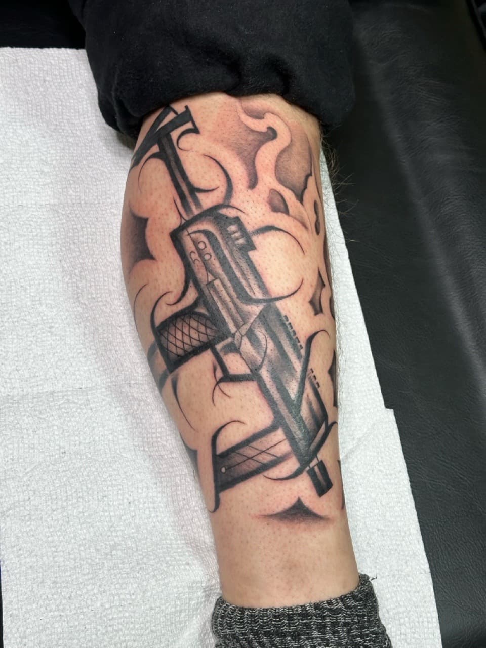 Black & Grey + Illustrative gun tattoo on Forearm by Tattoos_By_Dolph on TattMe