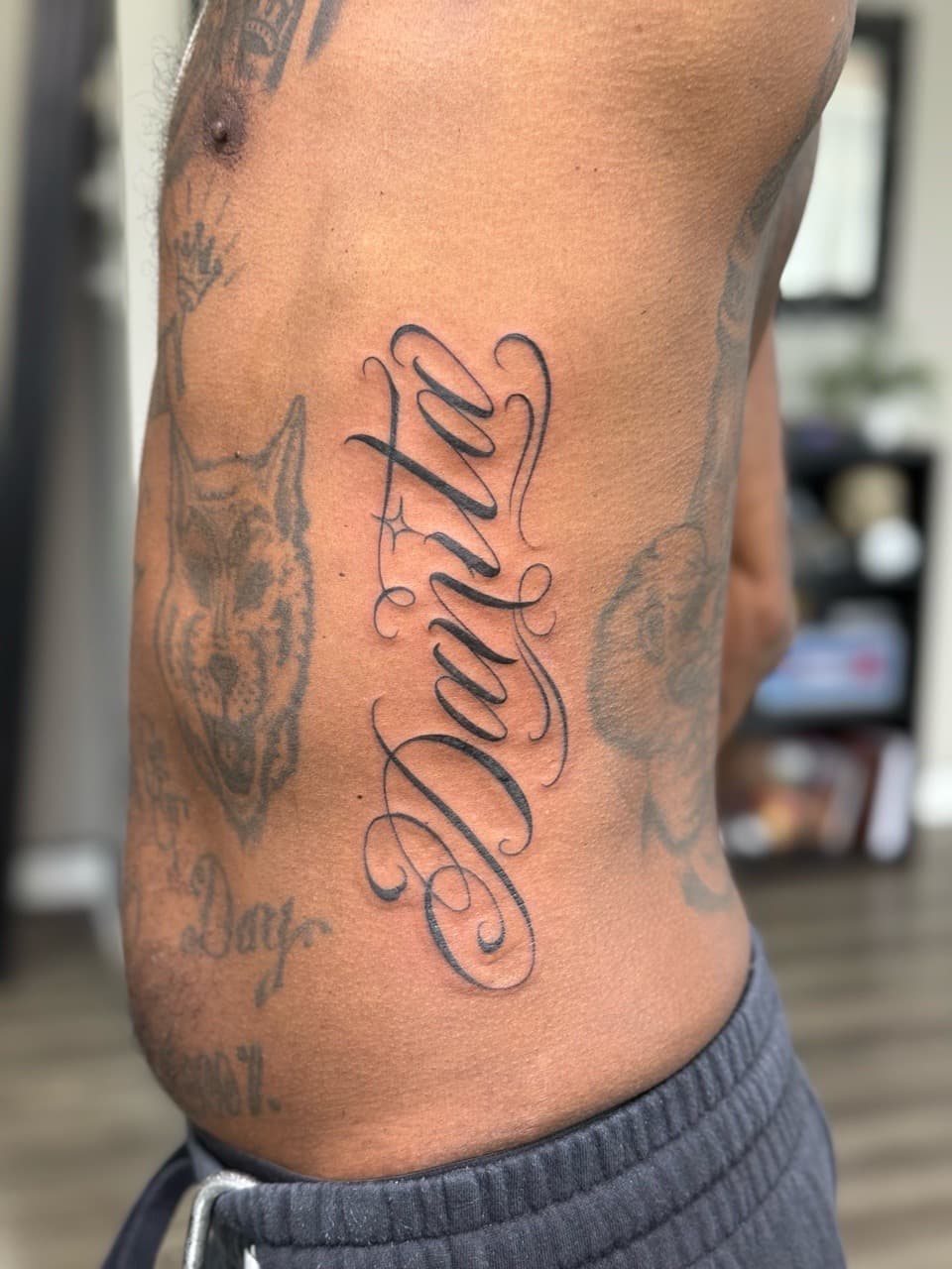Lettering + Script name tattoo on Ribs by Tattoos_By_Dolph on TattMe