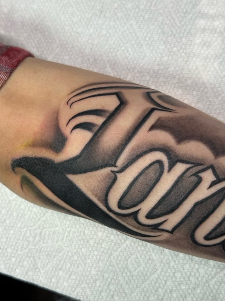 Black & Grey + Lettering chicano tattoo on Forearm by Tattoos_By_Dolph on TattMe