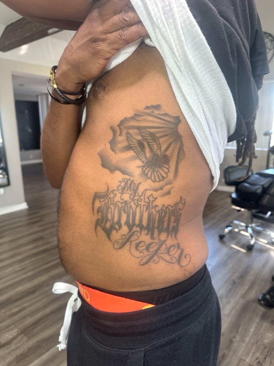 Black & Grey + Lettering dove tattoo on Ribs by Tattoos_By_Dolph on TattMe