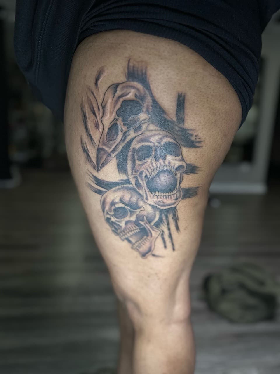 Black & Grey + Realism skulls tattoo on Thigh by Tattoos_By_Dolph on TattMe