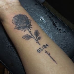Realism + Lettering rose tattoo on Forearm by tatsbyrayyy on TattMe