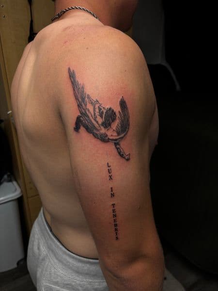 Fine Line + Black & Grey angel tattoo on Upper Arm by tatsbyrayyy on TattMe