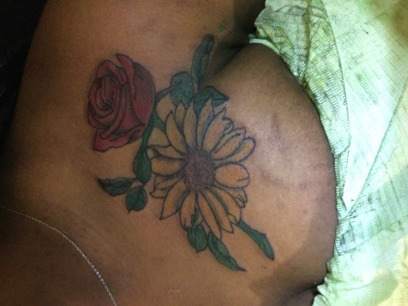 Floral + Color rose tattoo on Hip by MindBodyInkStudio on TattMe
