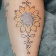 Line-work + Illustrative sunflower tattoo on Calf by MindBodyInkStudio on TattMe