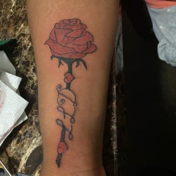Color + Lettering rose tattoo on Forearm by MindBodyInkStudio on TattMe