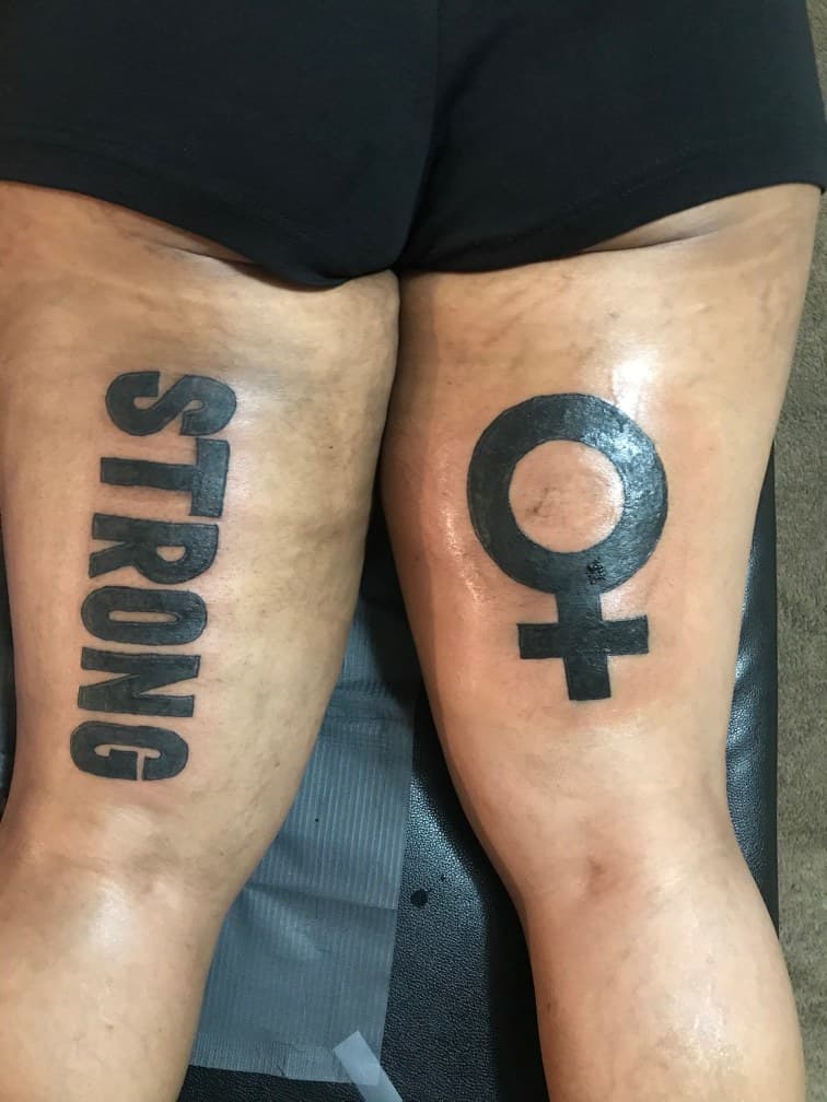 Lettering + Black-work strong tattoo on Thigh by MindBodyInkStudio on TattMe