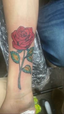 Traditional + Color rose tattoo on Wrist by MindBodyInkStudio on TattMe