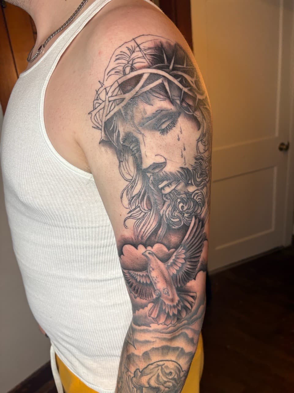 Black & Grey + Realism jesus tattoo on Upper Arm by MaleekInkz on TattMe