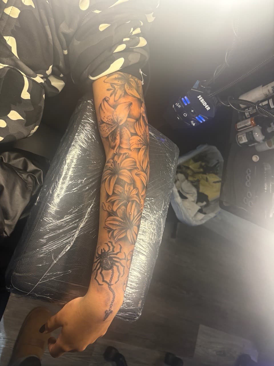 Black & Grey + Floral lilies tattoo on Forearm by MaleekInkz on TattMe