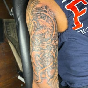 Black & Grey + Illustrative lion tattoo on Half Sleeve by MaleekInkz on TattMe