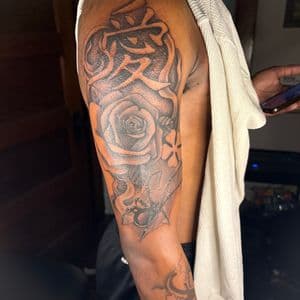 Black & Grey + Lettering rose tattoo on Half Sleeve by MaleekInkz on TattMe