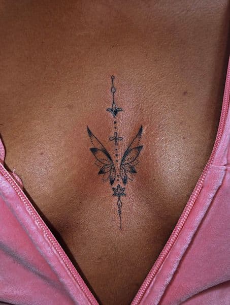 Fine Line + Minimalist wings tattoo on Sternum by Wasted_Ink on TattMe