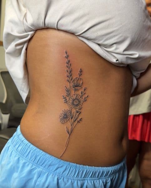 Fine Line + Floral flowers tattoo on Ribs by Wasted_Ink on TattMe