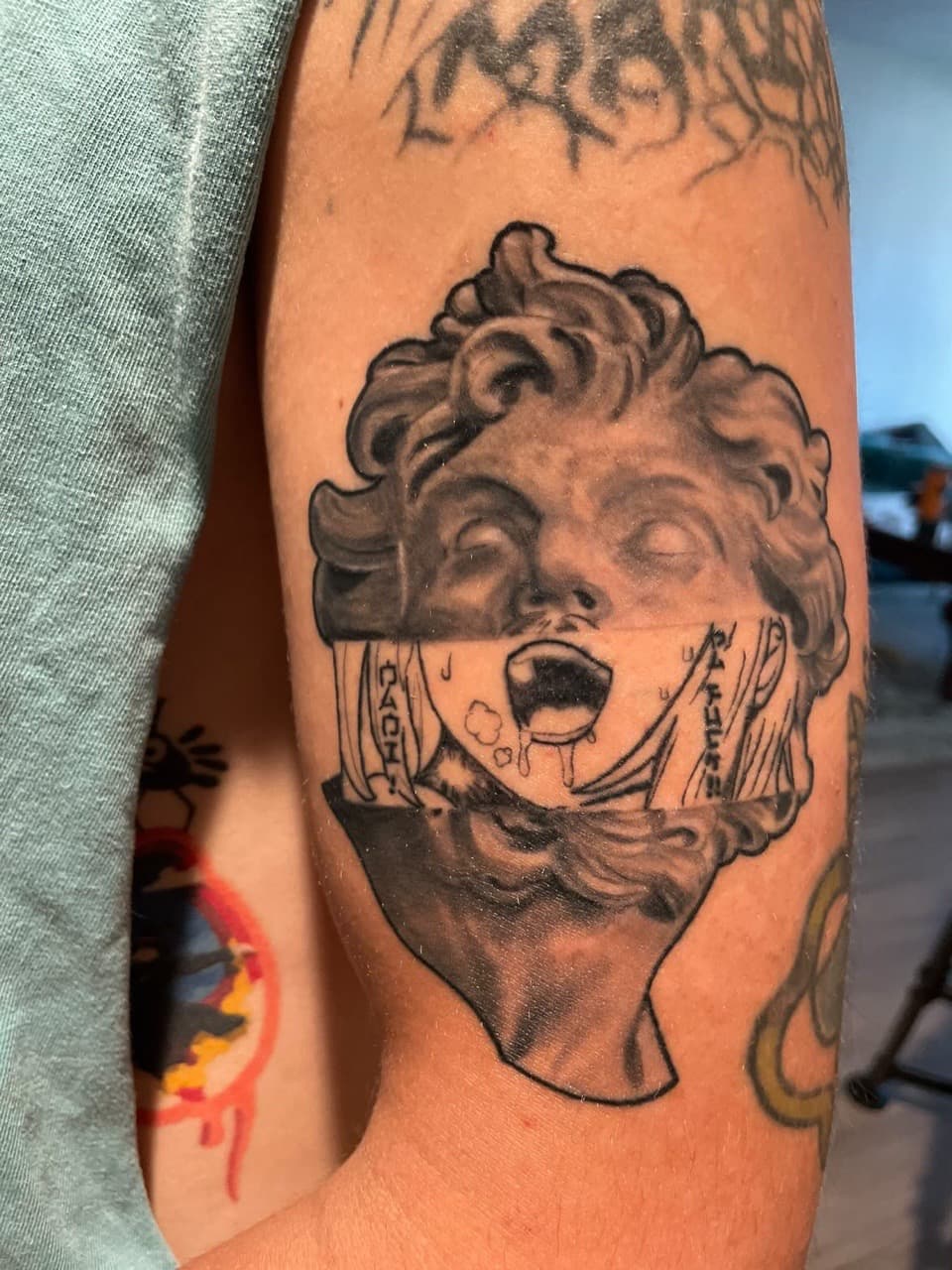 Black & Grey + Anime bust tattoo on Upper Arm by Rey_Sanchez on TattMe