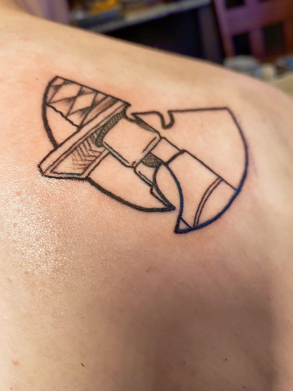 Line-work + Pop Culture sword tattoo on Shoulder Blade by Night_Veil_Ink on TattMe