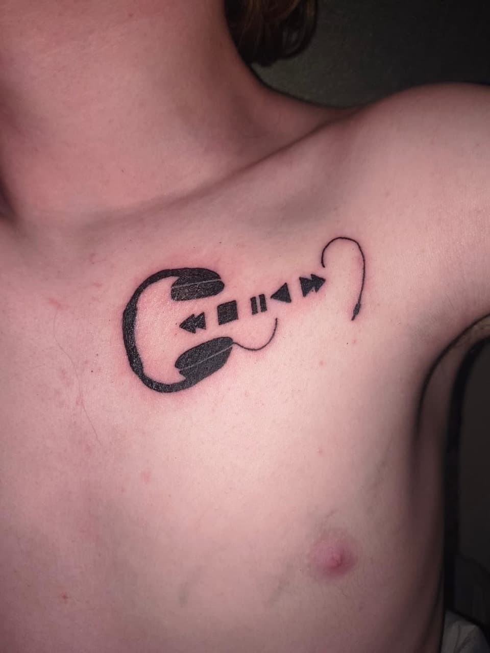 Black-work + Minimalist headphones tattoo on Chest by Night_Veil_Ink on TattMe