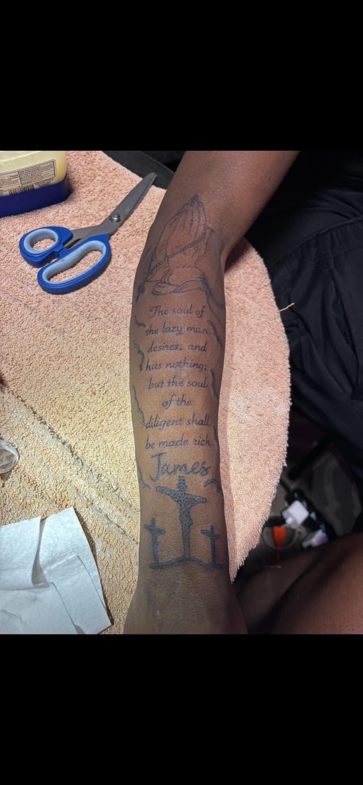 Lettering + Religious praying hands tattoo on Forearm by JrrrInkkk on TattMe
