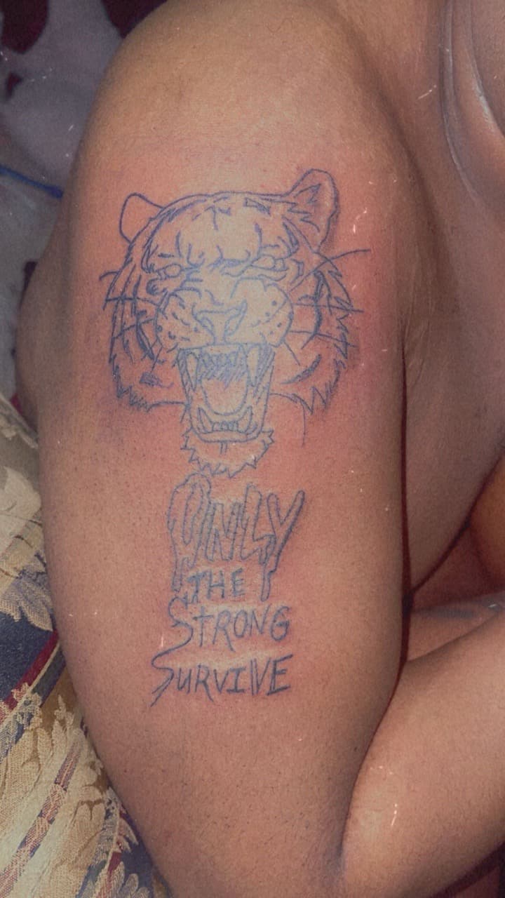 Line-work + Lettering tiger tattoo on Upper Arm by JrrrInkkk on TattMe