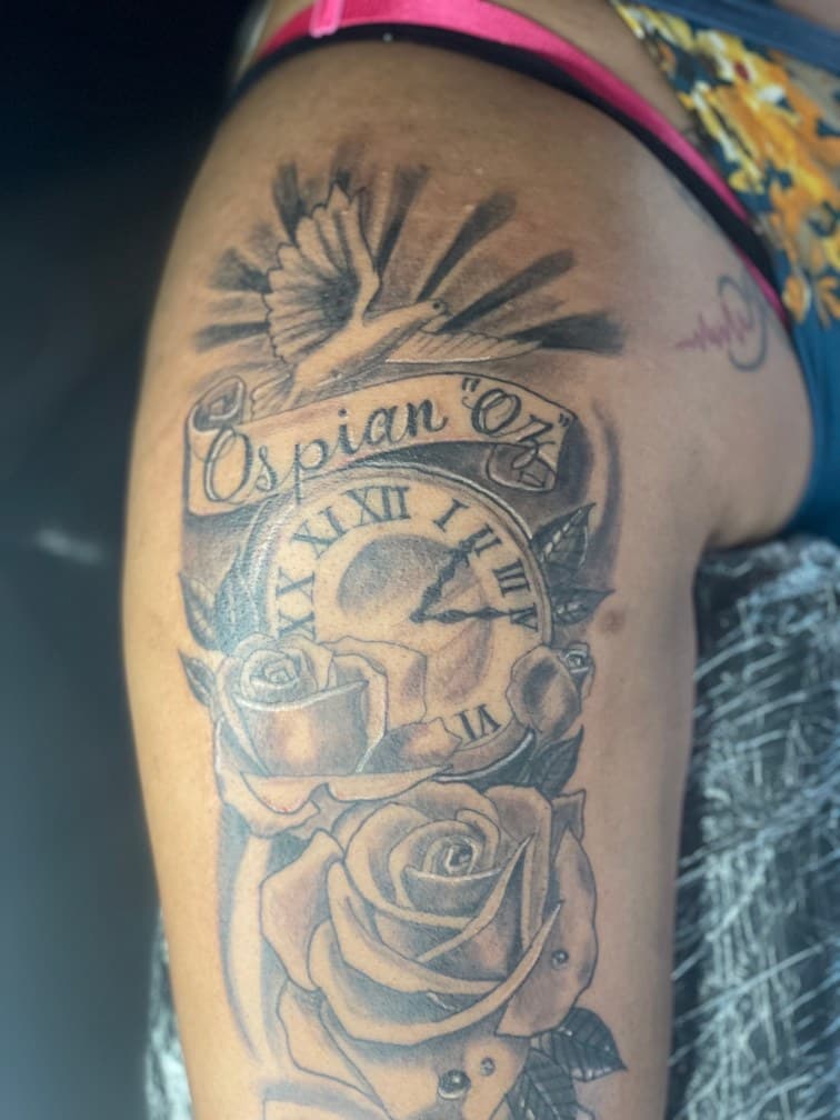 Black & Grey + Illustrative roses tattoo on Upper Arm by Jamarious_Cook on TattMe